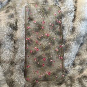 I’m selling an iPhone 12 pro max case that’s clear with floral designs on it.